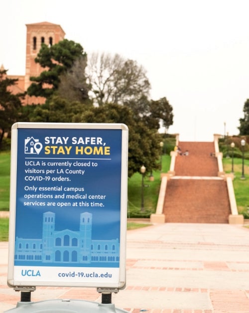 COVID-19 Stay Safer Stay Home sign at UCLA