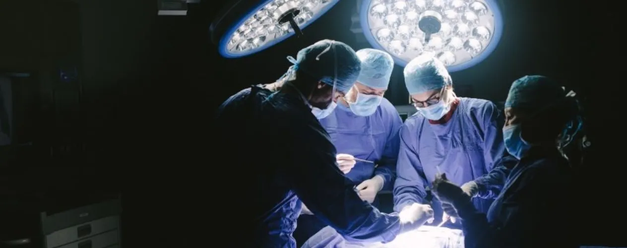 Doctors at operating table