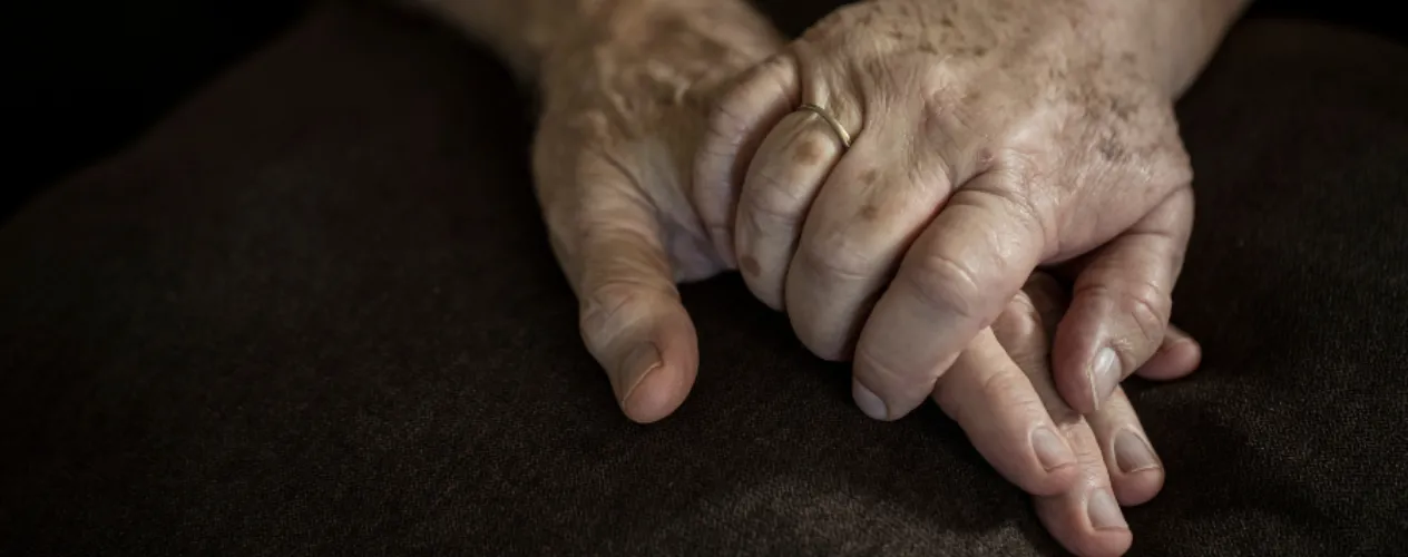 Hands holding each other