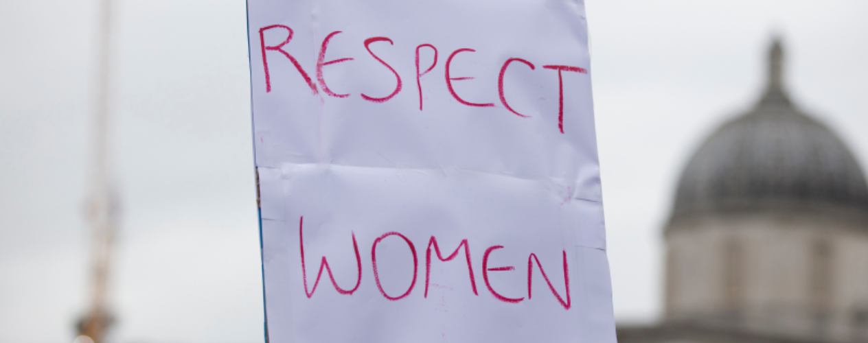 Sign reading, "Respect Women"