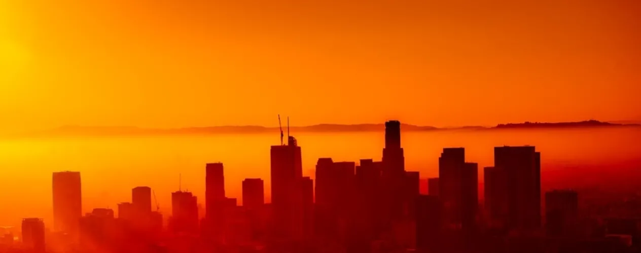Orange sky and city skyline