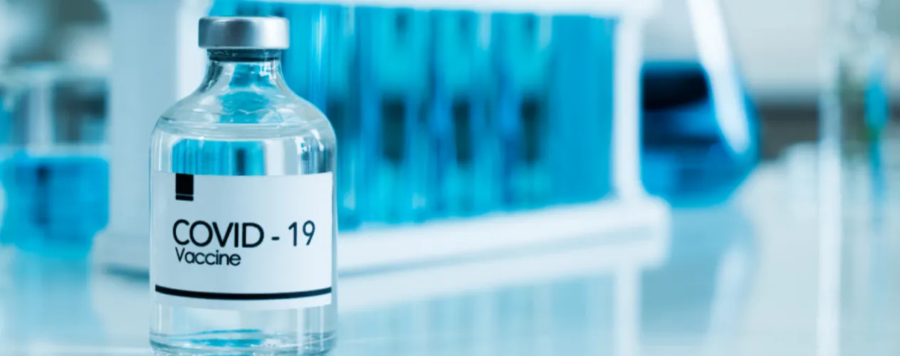 Vial labeled COVID-19 vaccine