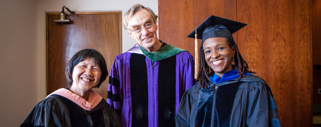 faculty in graduation regalia