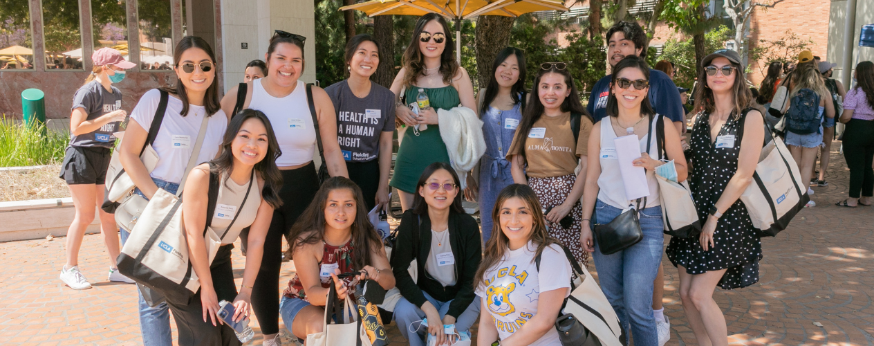 students standing in a group smiling