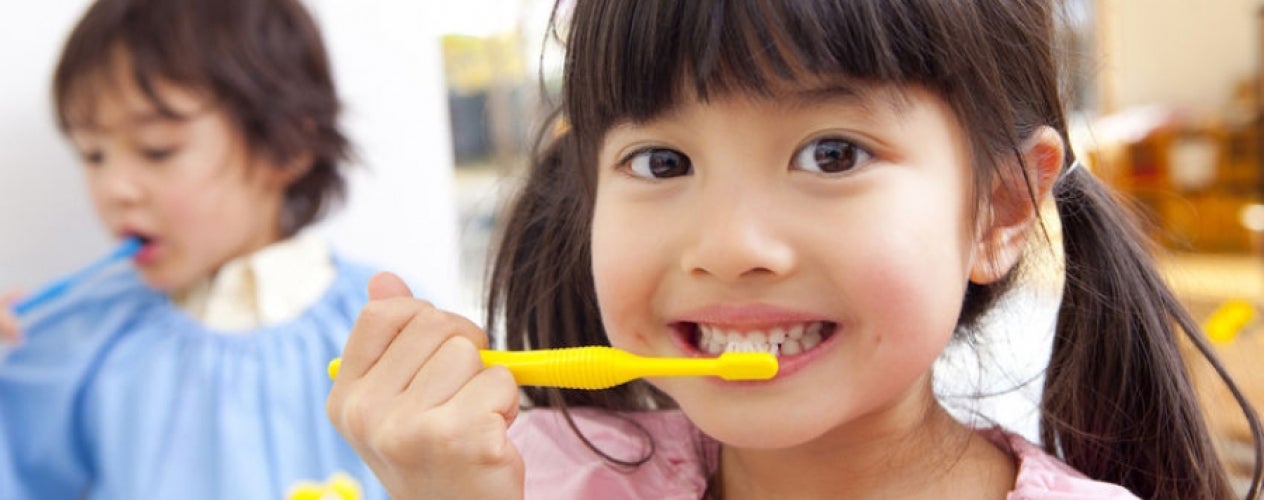 Children brushing their teeth