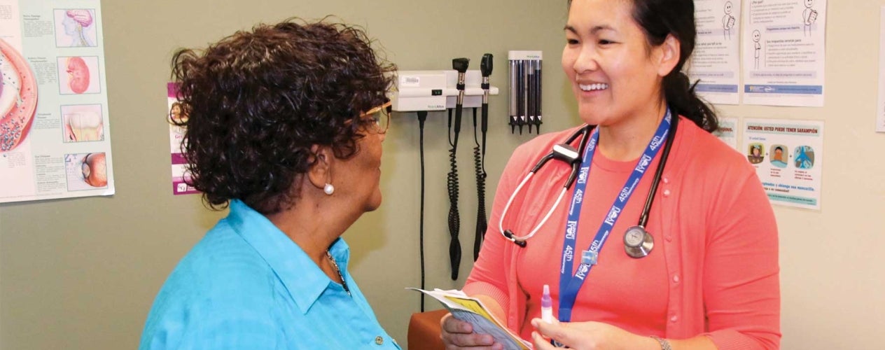 Nurse giving a patient a test