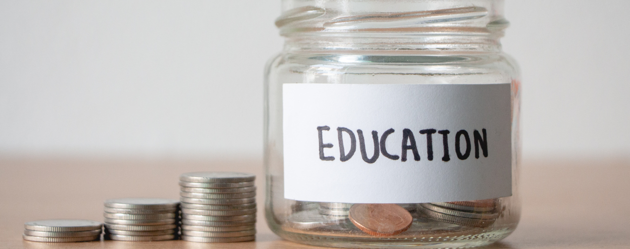 jar of money with label that says education