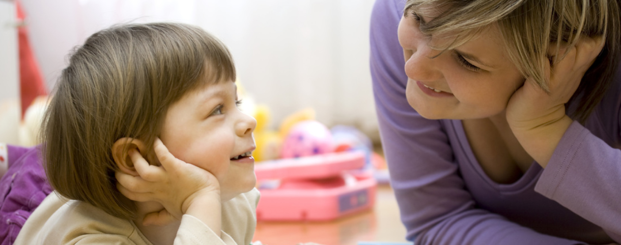 Women talking to child