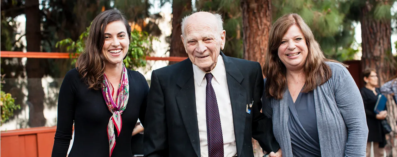Dr. Ray Goodman with daughter Laura Oliva (right) and Emerald Snow (MS '16), a graduate of FSPH's Department of Community Health Sciences, in 2016.