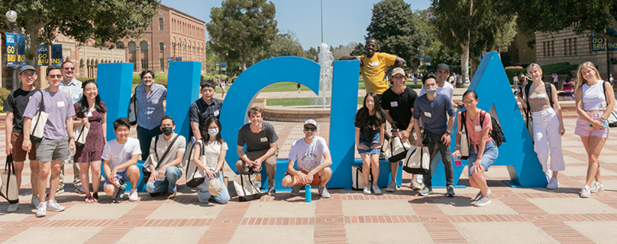 students in front of UCLA letters