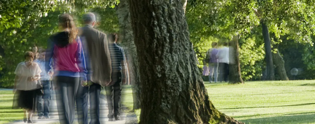 blurry figures walking