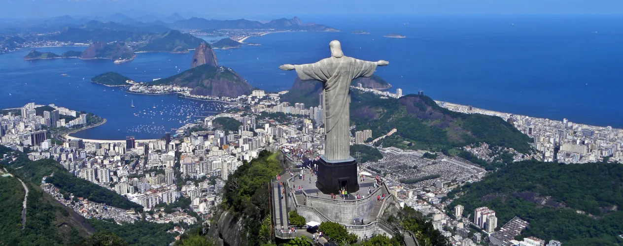 Aerial photo of Rio with Christ the Redeemer statue in foreground