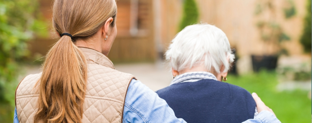 woman comforting an elderly man