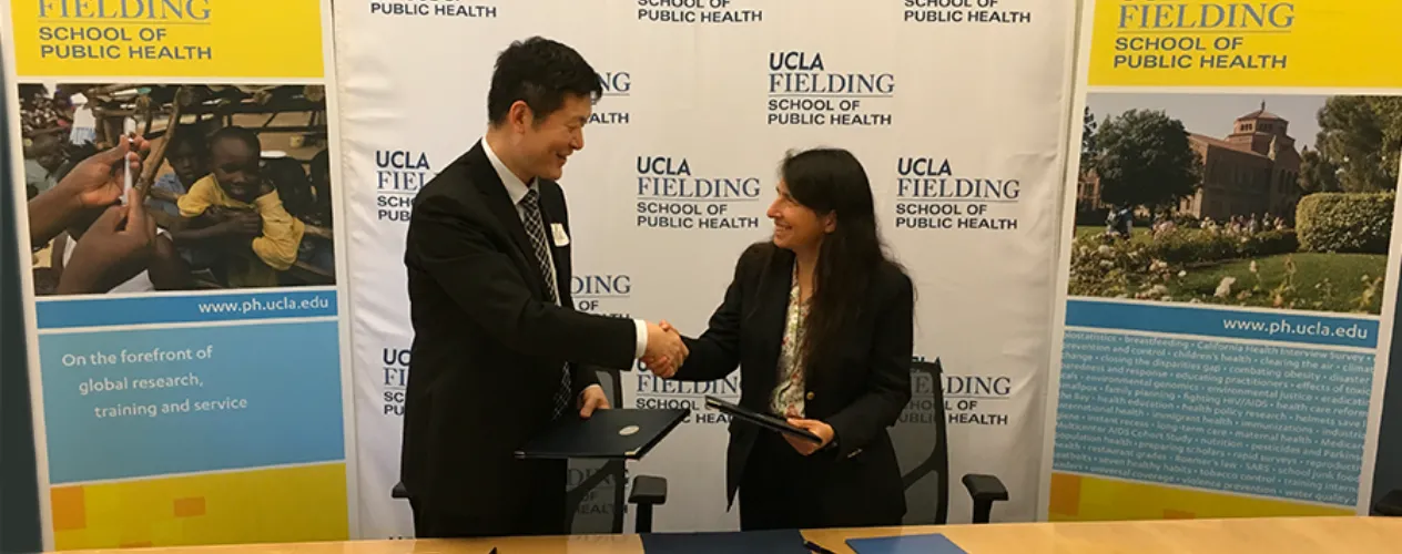 two people shaking hands
