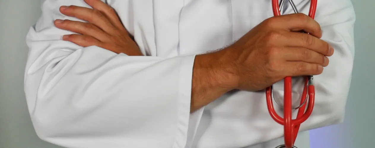 doctor holding stethoscope