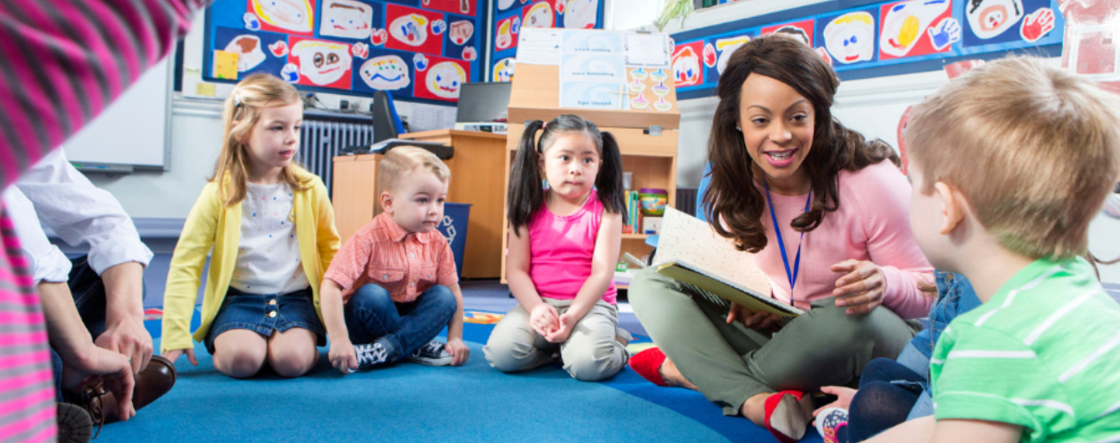 teacher talking with students