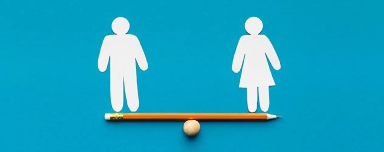 man and woman balancing on pencil