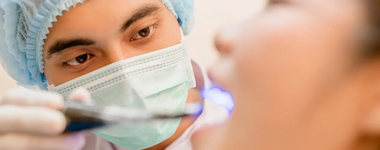 close-up of dentist
