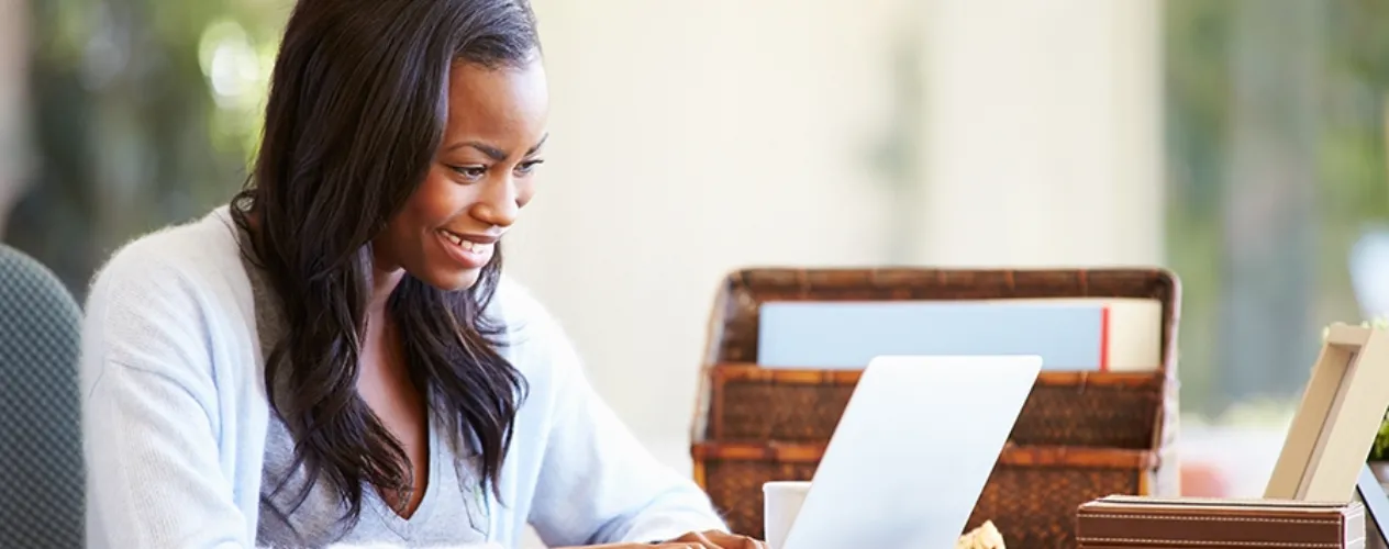 woman looking at computer scren