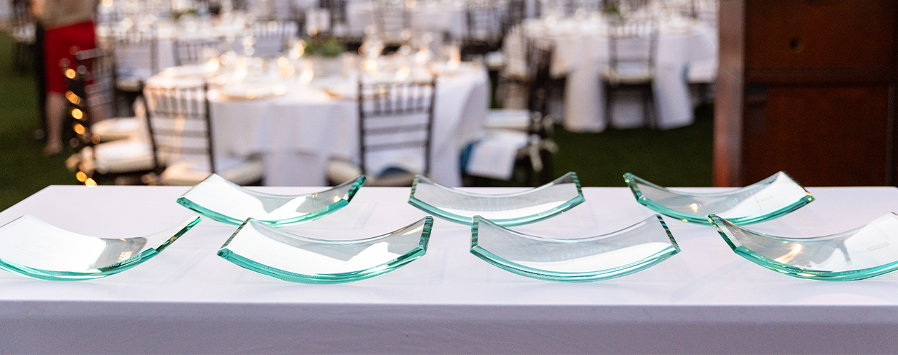 Glass Hall of Fame Awards Displayed on Table