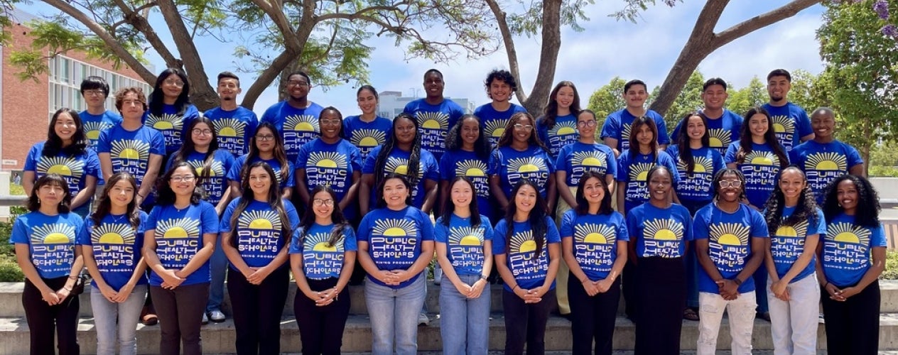 2024 cohort members in matching blue program t-shirts