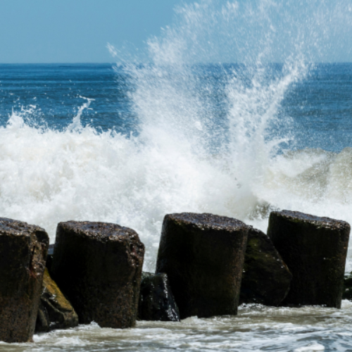 Ocean waves crashing against rocks