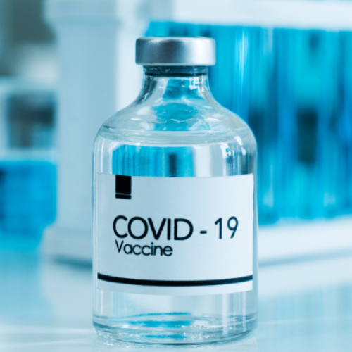 Vial labeled COVID-19 vaccine