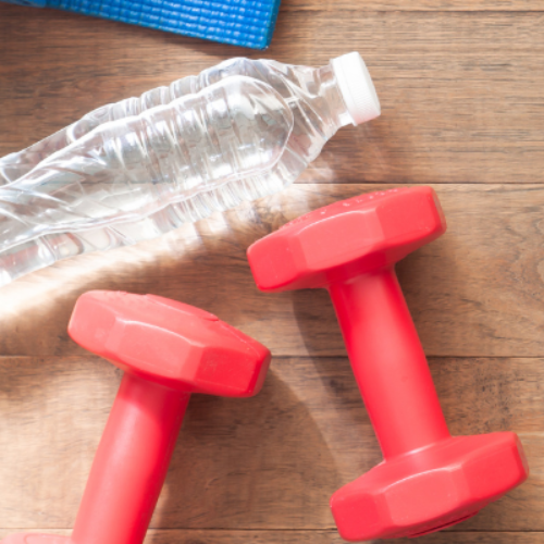 A water bottle and two hand weights