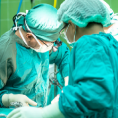 Surgeons at operating table