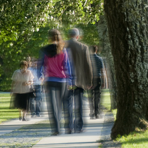 blurry figures walking