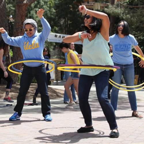 students hula-hooping