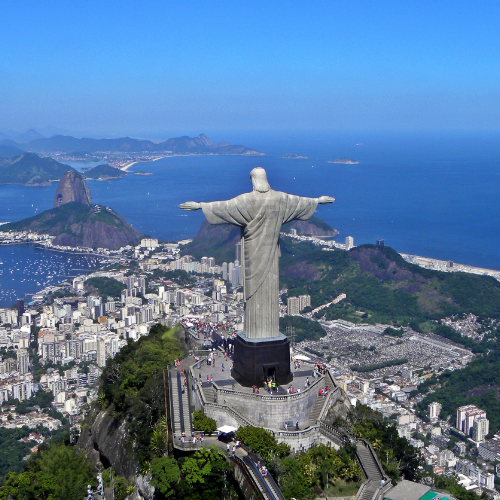 Aerial photo of Rio with Christ the Redeemer statue in foreground
