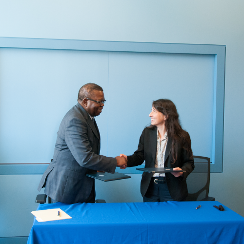 Dean Okitolonda and Dean Heymann shaking hands