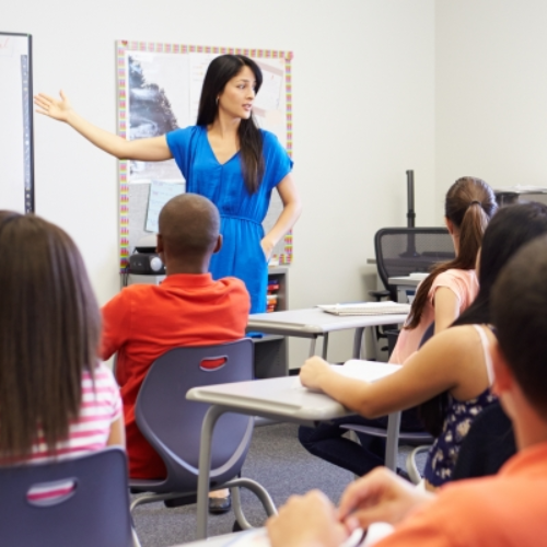 teacher and students in a classroom