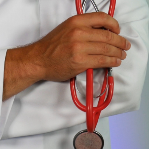 doctor holding stethoscope