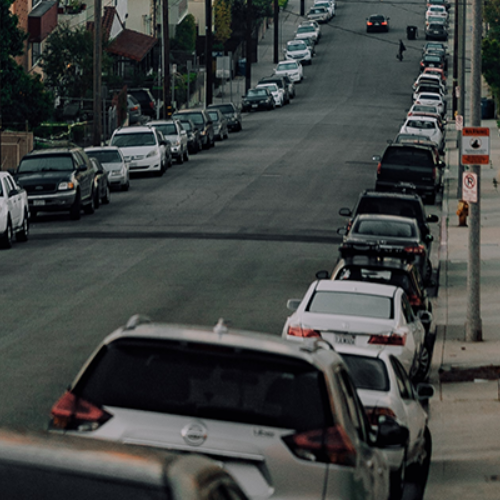 street lined with cars