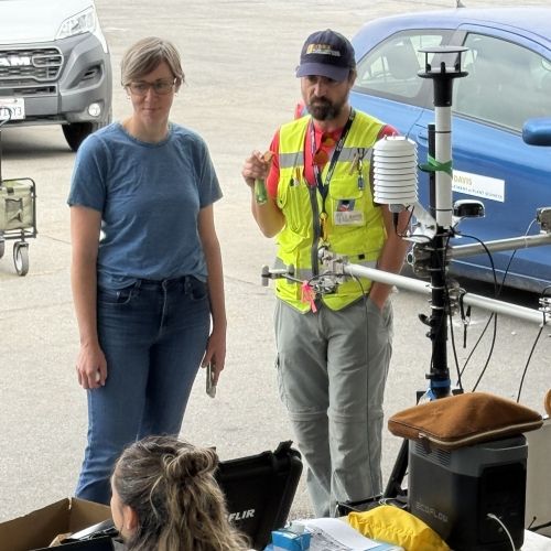 Dr. Kirsten Schwarz, left, and Dr. Alessandro Ossola, right, prepare for field work at a public school as part of the California School Tree Study.