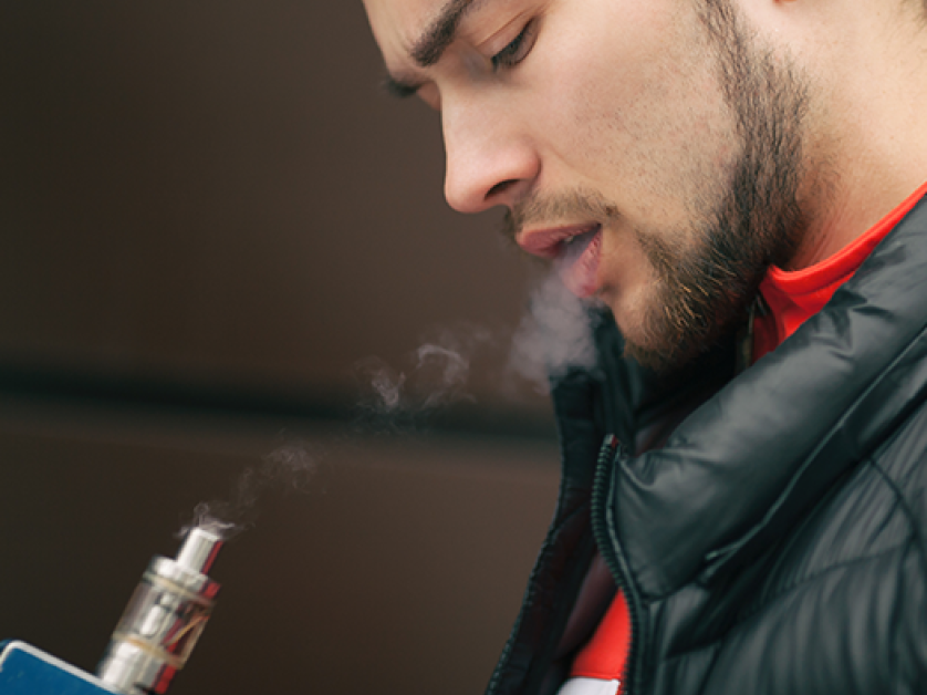 Man smoking an e-cigarette