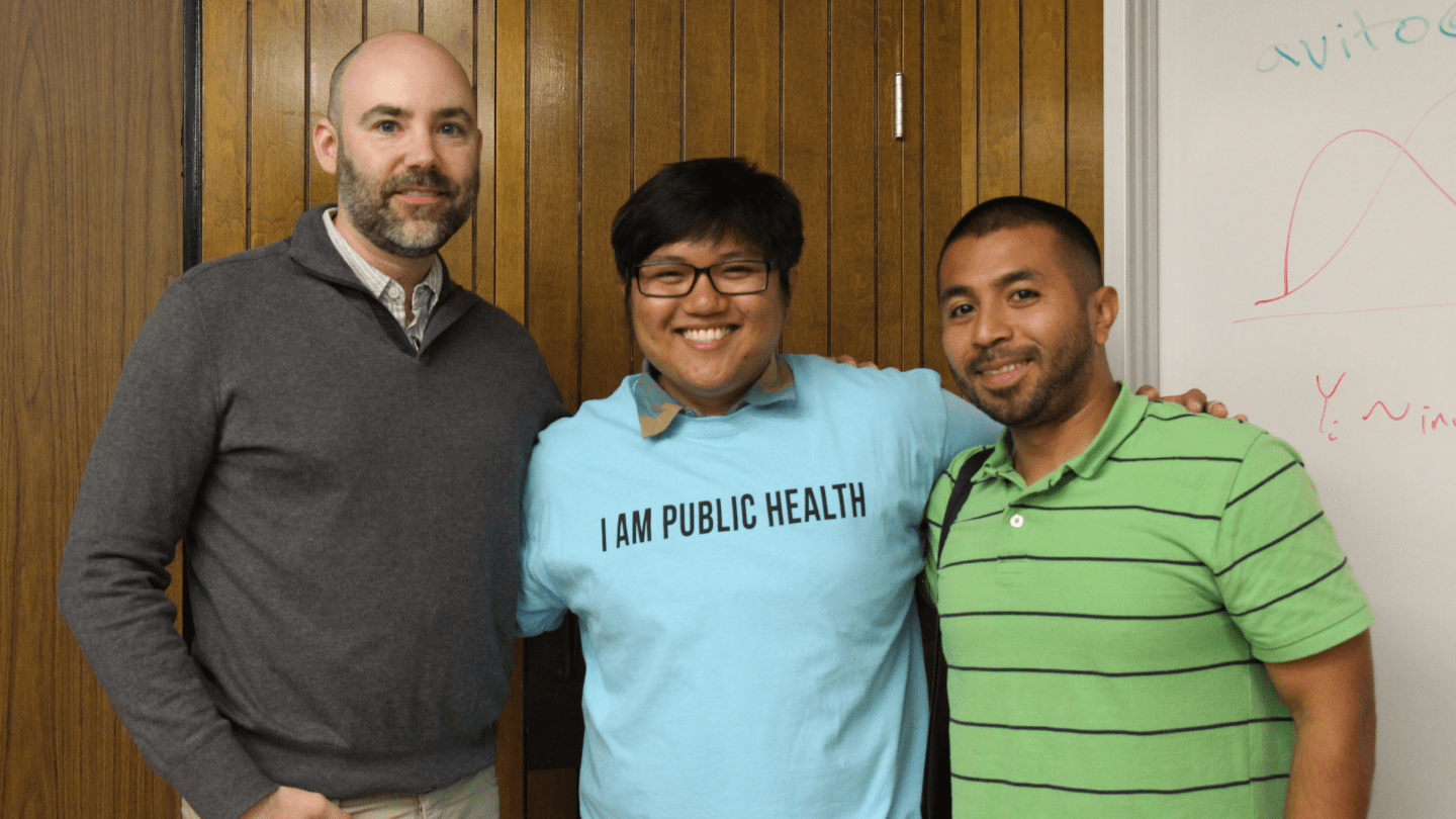 Three men posing together after Labor and Health session